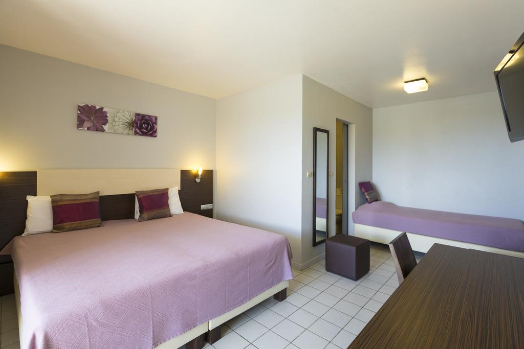 Hotel Atlantis Куру Номер фото